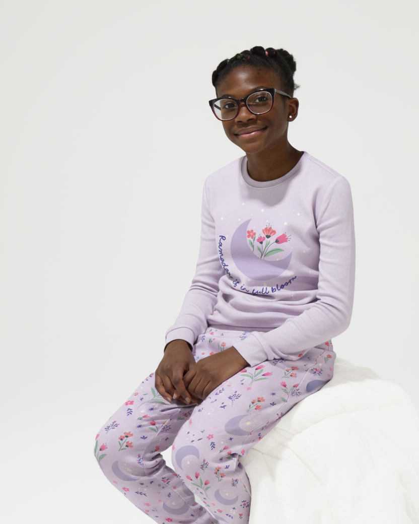 Ramadan pajamas that read "ramadan is in full bloom"