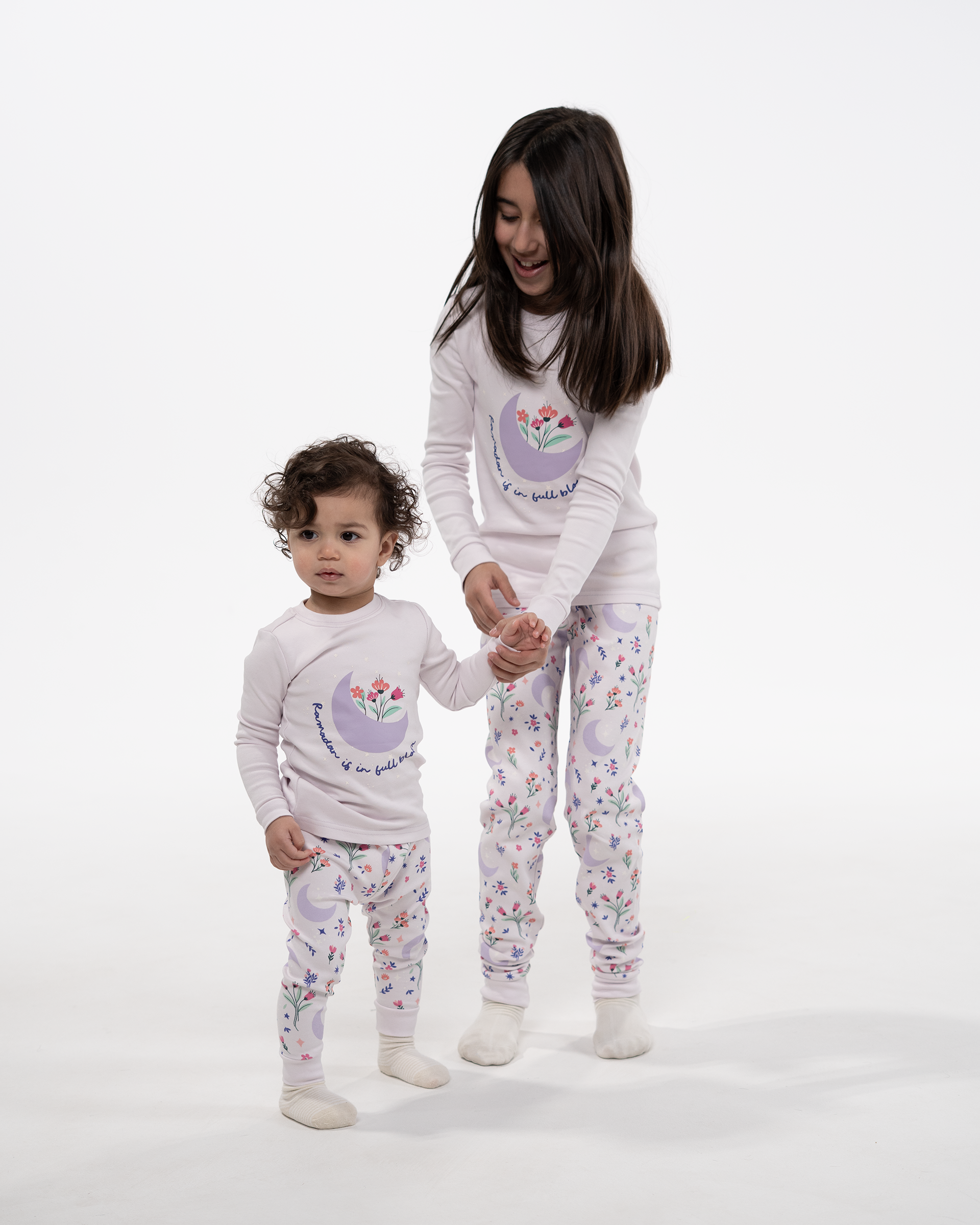 Ramadan pajamas that read "Ramadan is in full bloom"