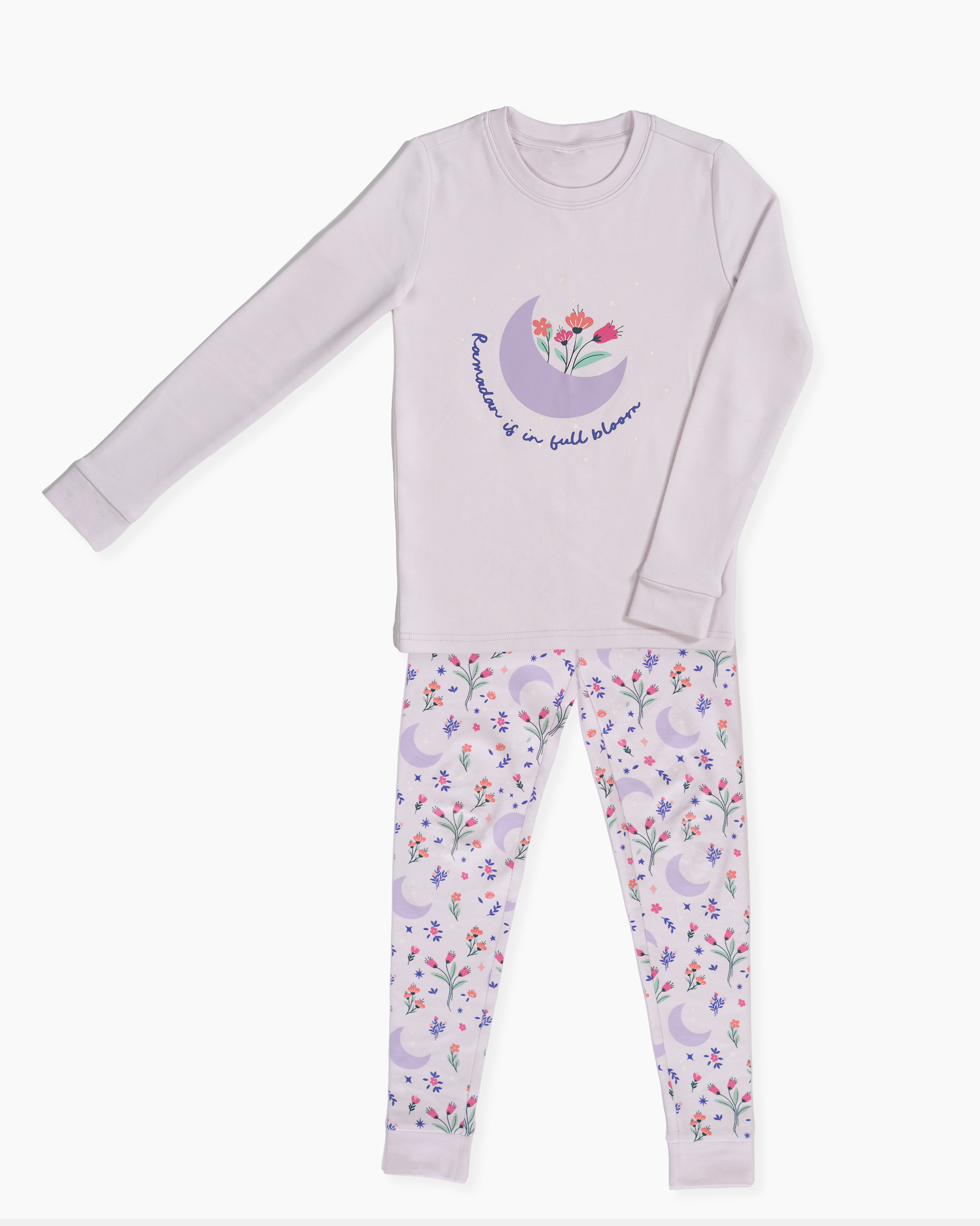 Ramadan pajamas that read "ramadan is in full bloom"