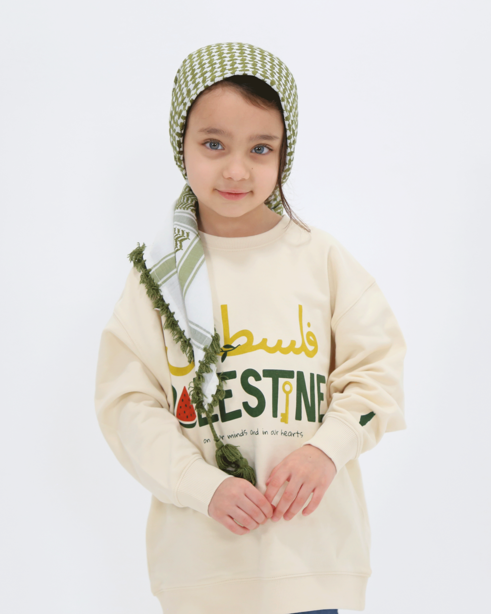 kids wearing Palestine sweater
